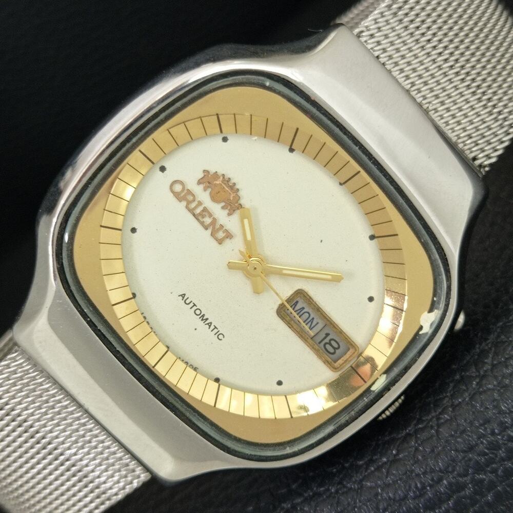 Vintage 1974 Orient Automatic Mens Silver Watch W/daydate & Gold accents